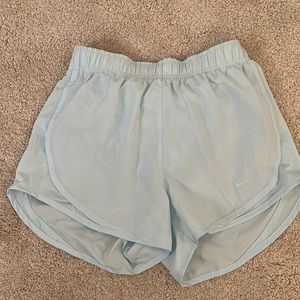 Light blue nike dri fit women’s shorts.